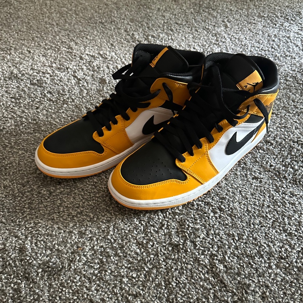 Nike Air Jordan Black, Yellow, and White Sneakers